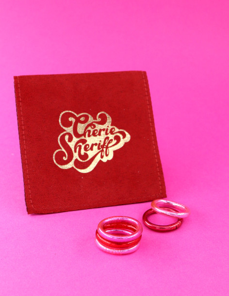 Set of 5 Red and Pink Rings with pouch