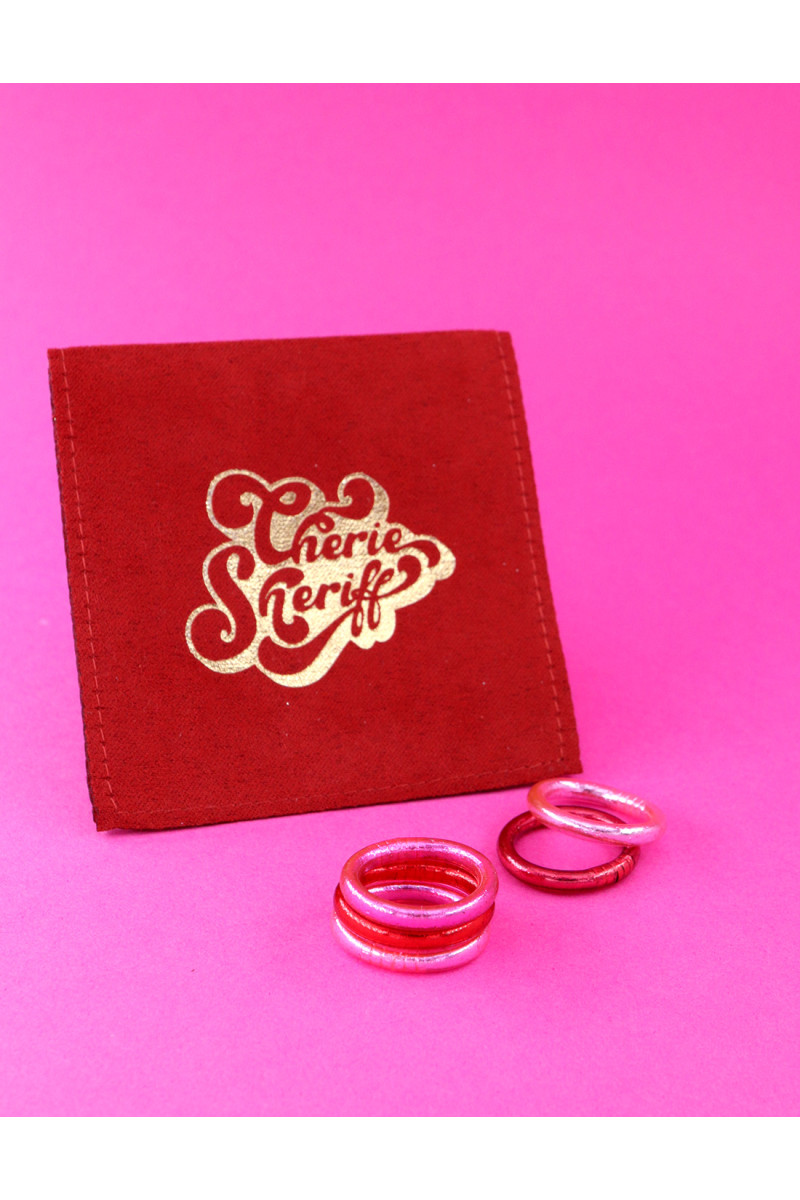 Set of 5 Red and Pink Rings with pouch